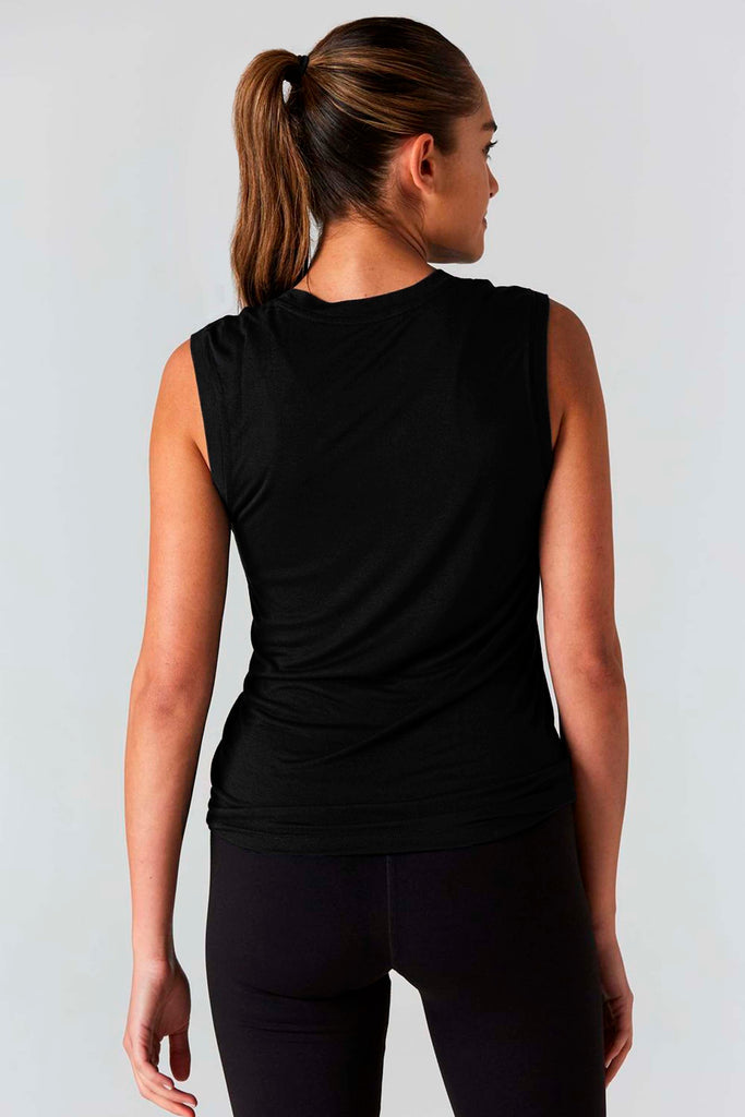 Woman is wearing 9 2 5 fit The Vine Muscle Tee Black